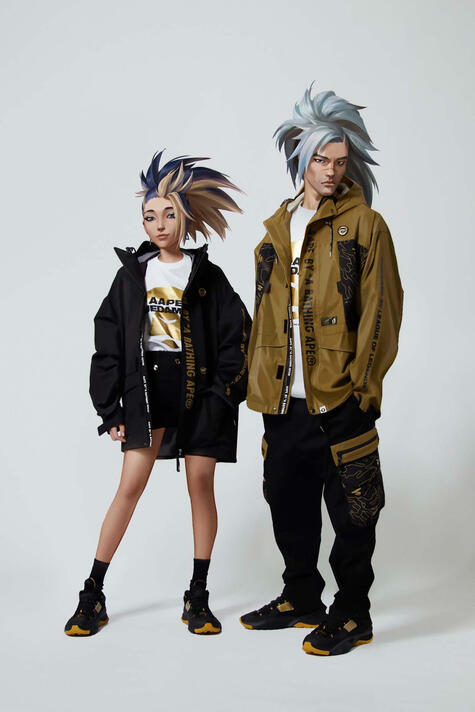 KDA/True Damage x AAPE brand collaboration. Social media promotional illustration of virtual band members/League of Legends characters Akali and Yasuo repping items from AAPE's League-inspired fashion line.
